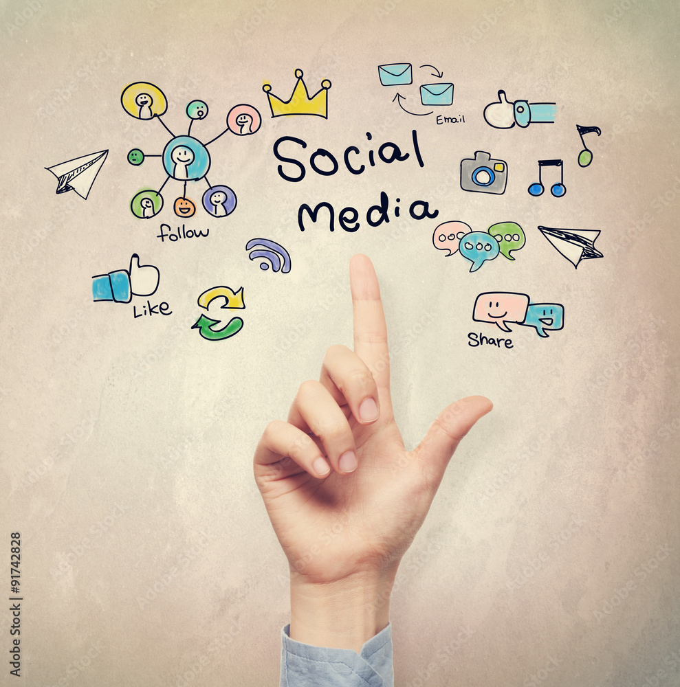 Hand pointing to Social Media concept