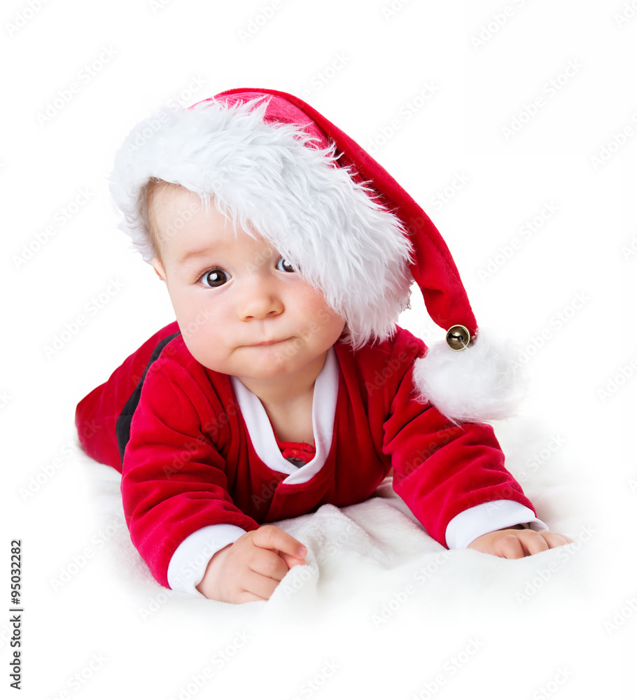 穿着圣诞老人服装的婴儿被隔离在白色背景上