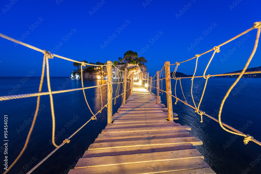 Hanging bridge to the island at night, Zakhynthos in Greece