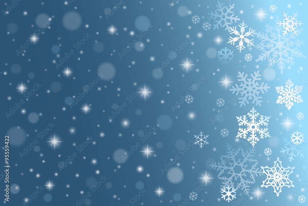 Blue winter background with falling snowflakes