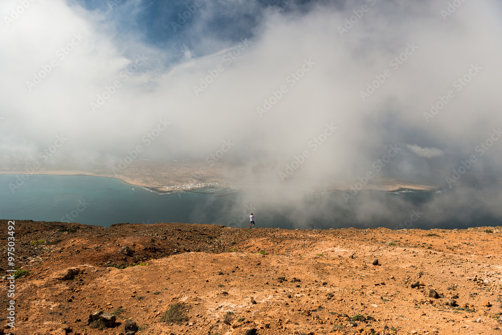 photographer taking picture in mist on Lanzarote