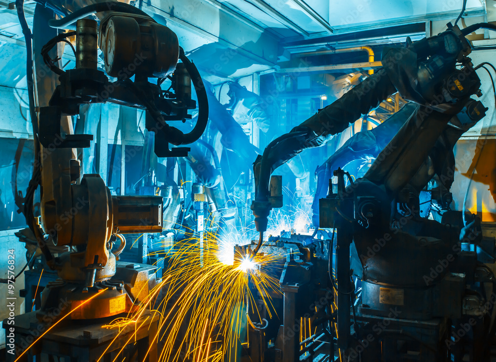 团队焊接机器人运动工厂中的工业汽车零件