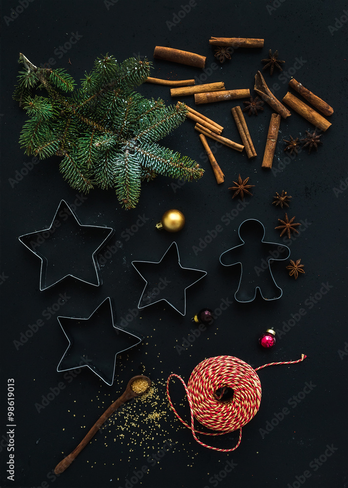 Baking ingredients for Christmas holiday traditional gingerbread cookies preparation, black backgrou