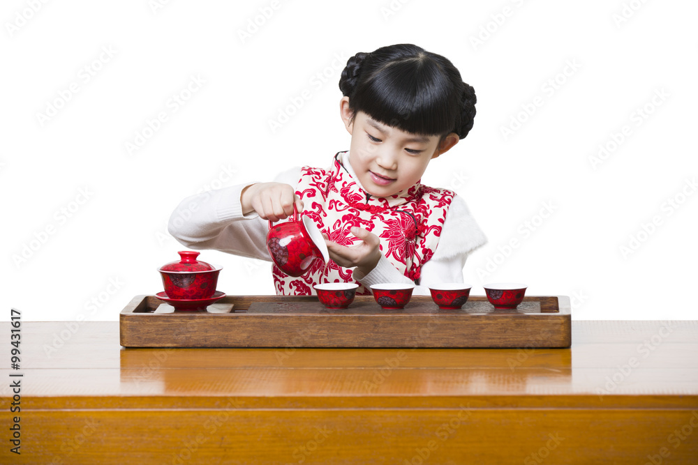 Happy girl performing tea ceremony