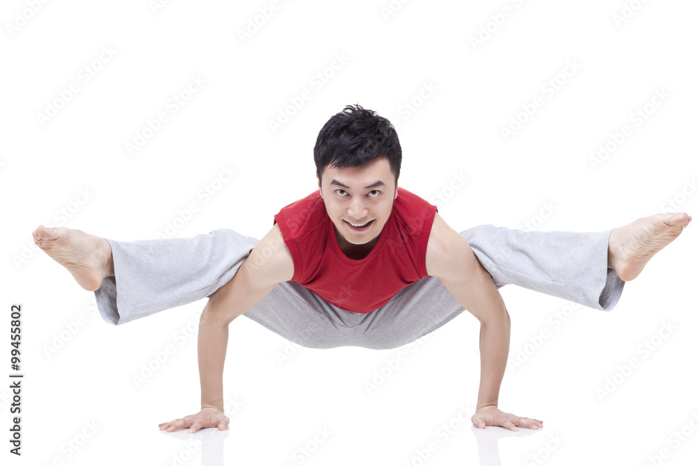 Young man doing yoga