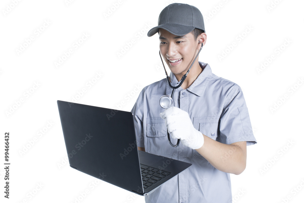Engineer checking laptop