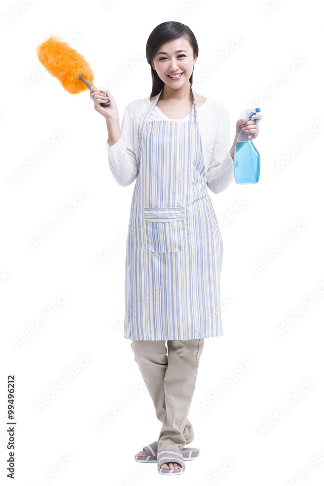 Housewife with cleaning product