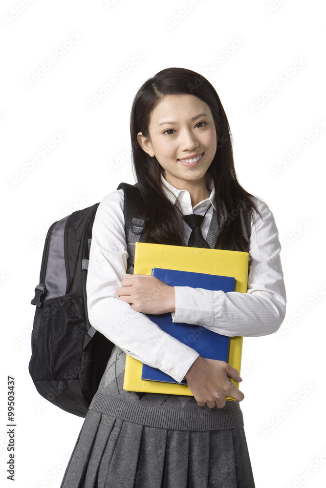 Schoolgirl holding her books