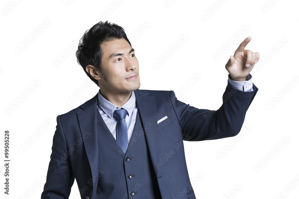 Young businessman pointing