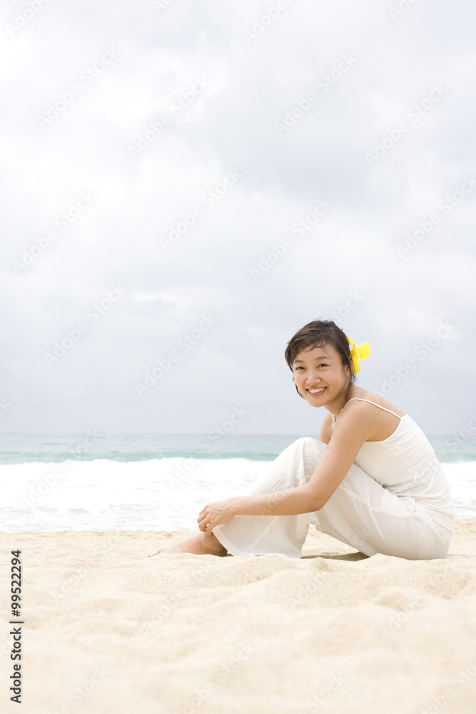 Portrait of a young woman at the beach