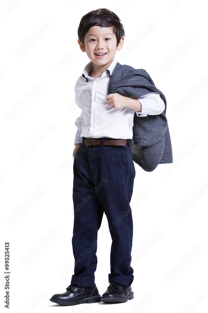 Trendy little boy with coat on shoulder