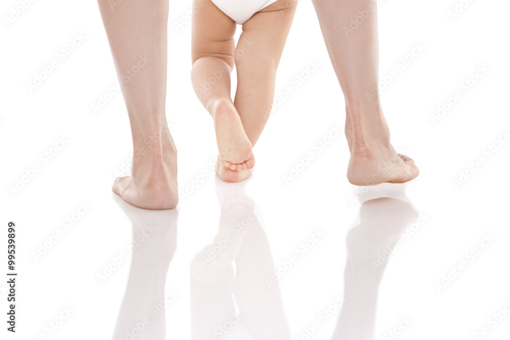 Baby and mother walking