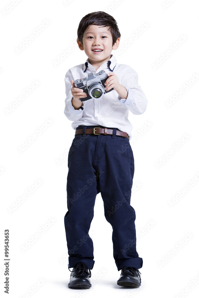 Trendy boy with camera