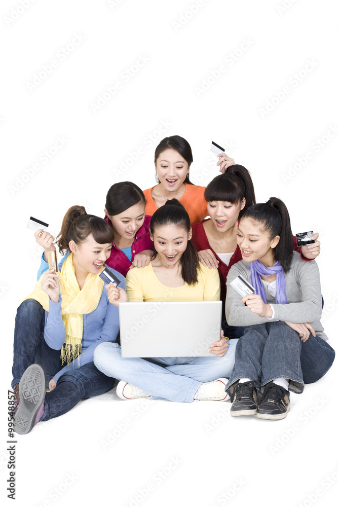 Young women shopping online