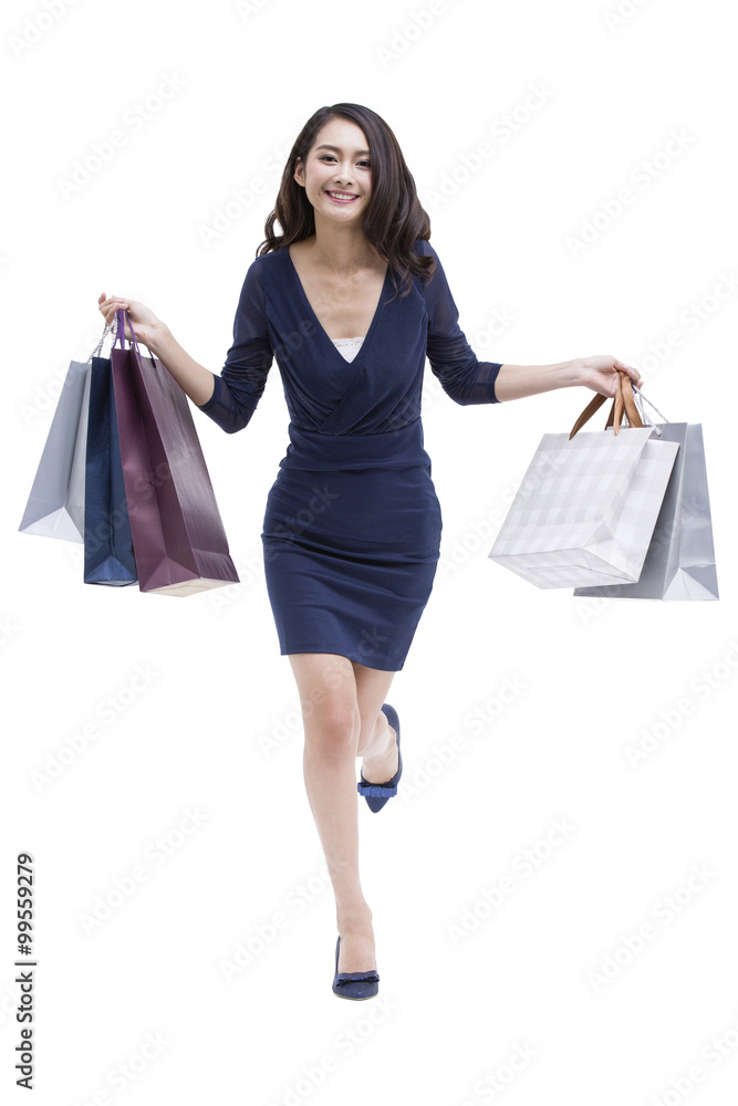 Cheerful young woman shopping