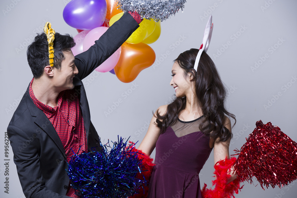 Happy young couple at a party