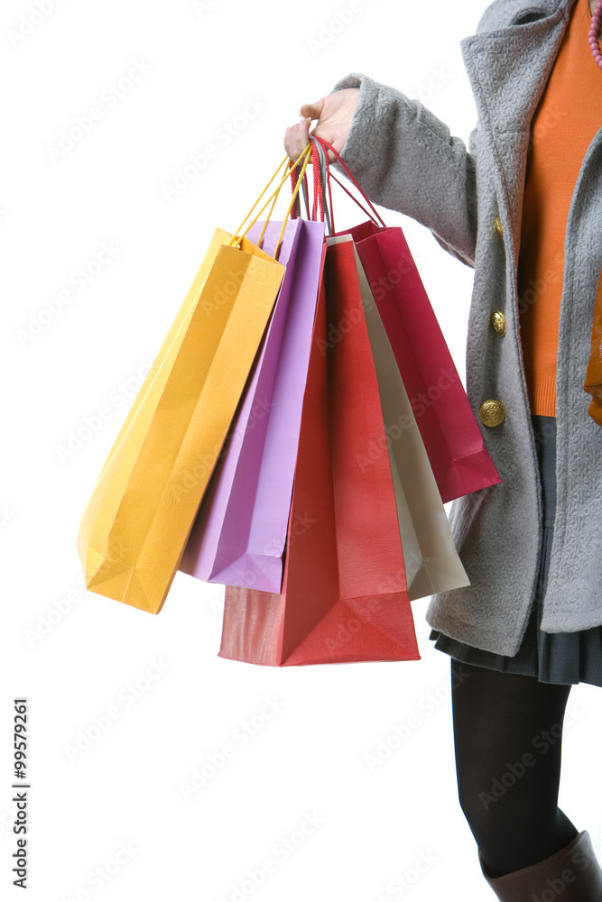 Shopping bags being held by a young woman