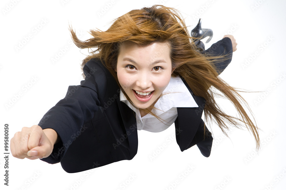 Young Businesswoman Flying Through The Air