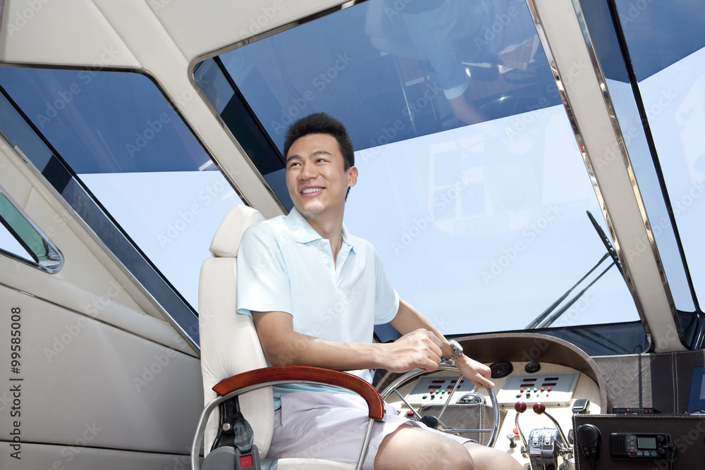 Man in a Yacht Cockpit
