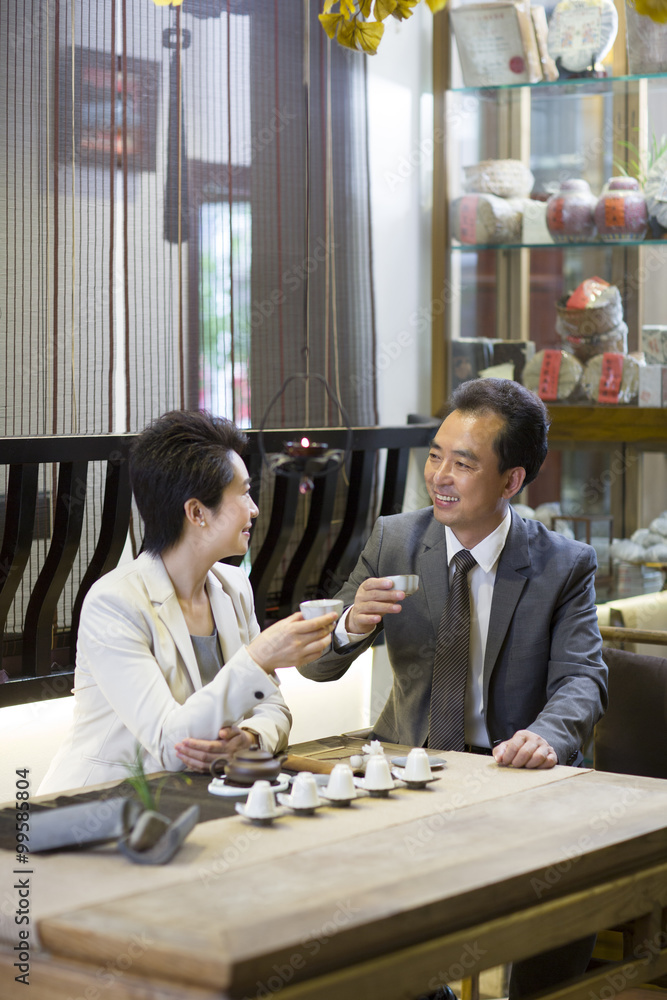 Business person drinking tea in tea room