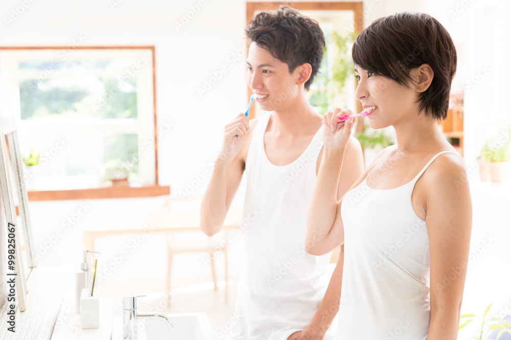portrait of young couple tooth care image