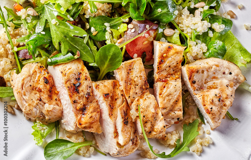 Quinoa and vegetable salad with grilled chicken