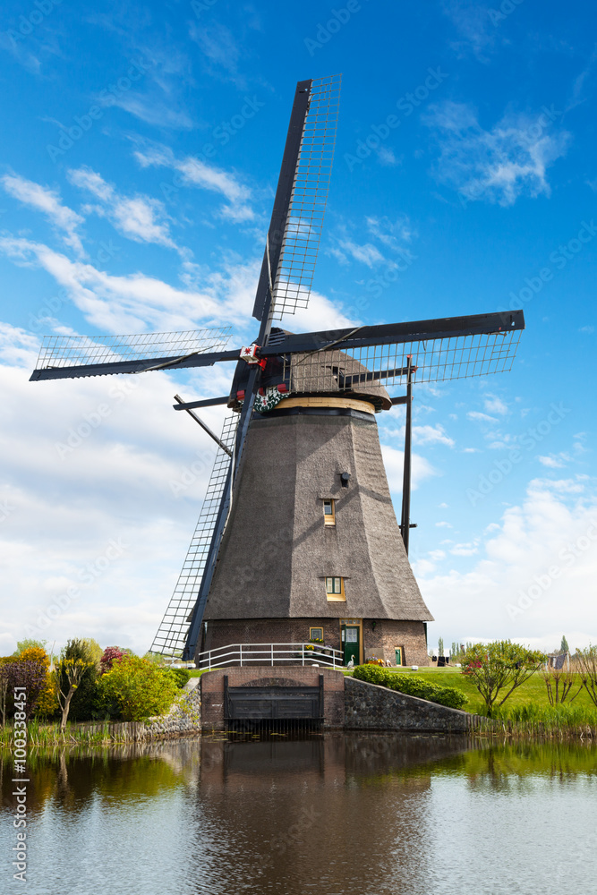 Windmill and water canal in Kinderdijk, Netherlands