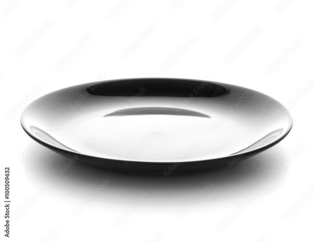 Empty black dish isolated. Black plate for the product