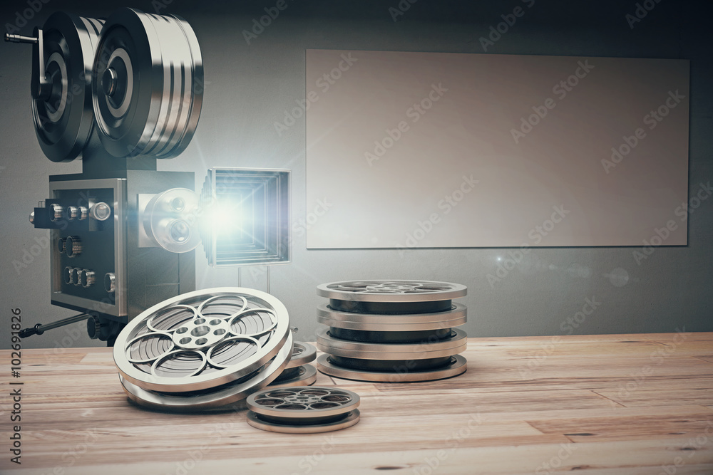 老式电影摄影机，带老式磁带和木制胶卷