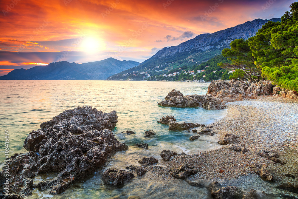 Romantic rocky beach with magical sunset,Brela,Dalmatia,Croatia,Europe