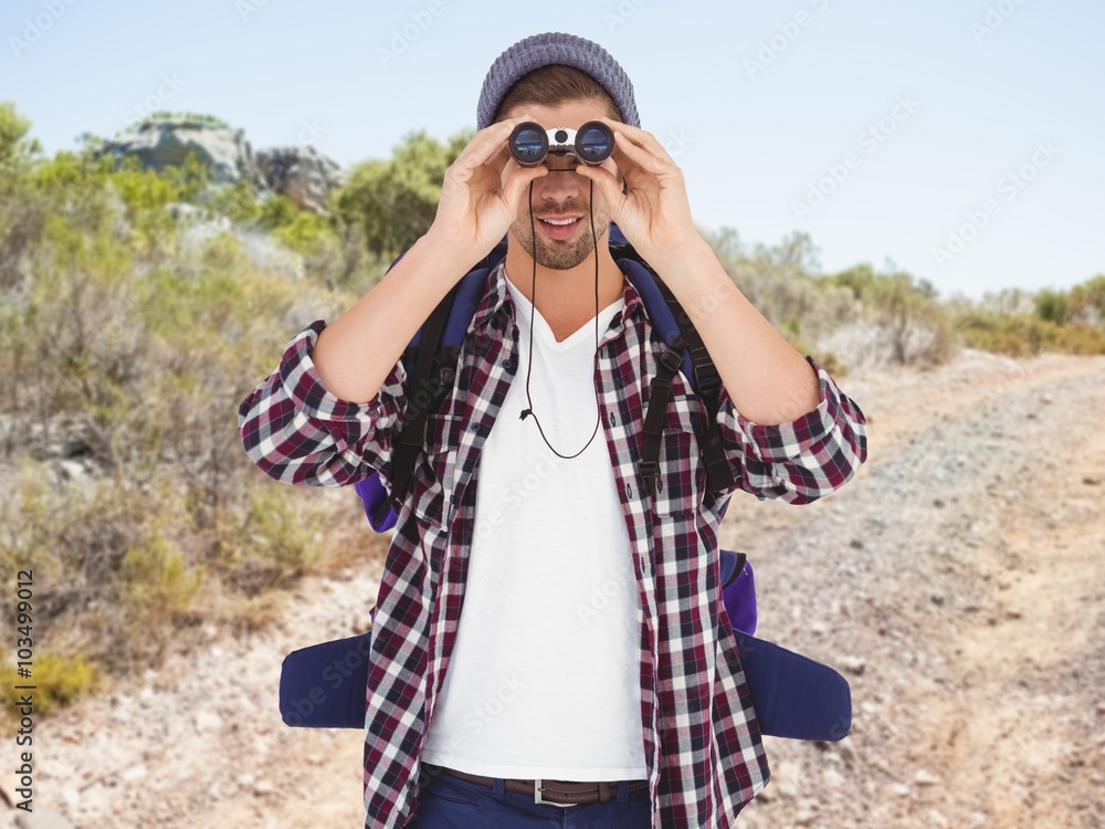 男子通过双筒望远镜观看的合成图像