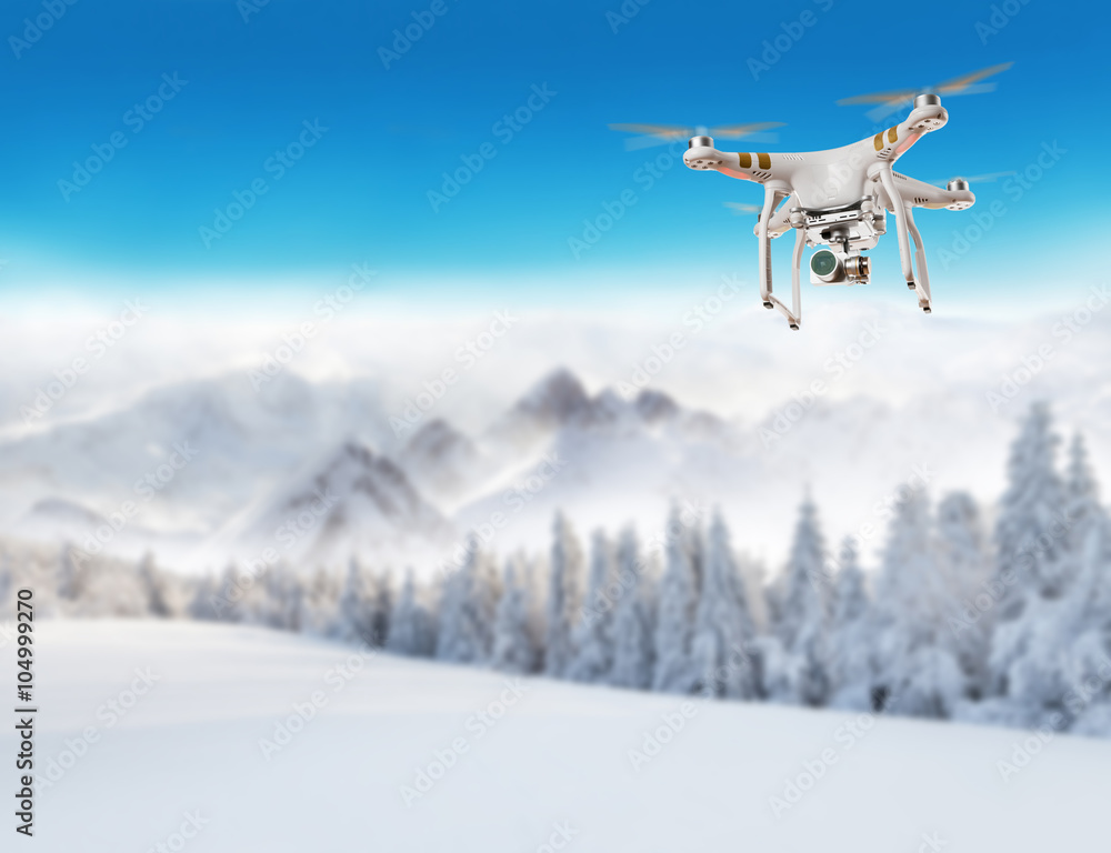 Flying drone in winter landscape