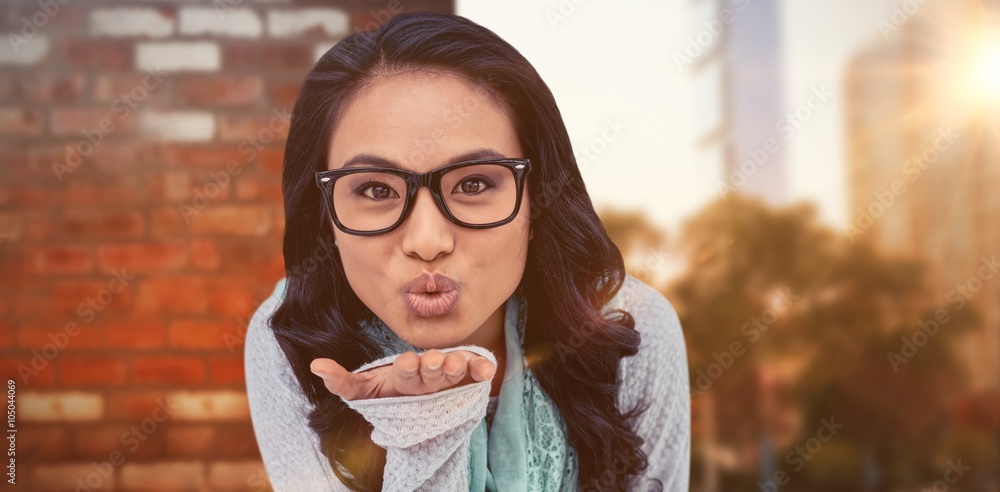 亚洲女子对着镜头飞吻的合成图像
