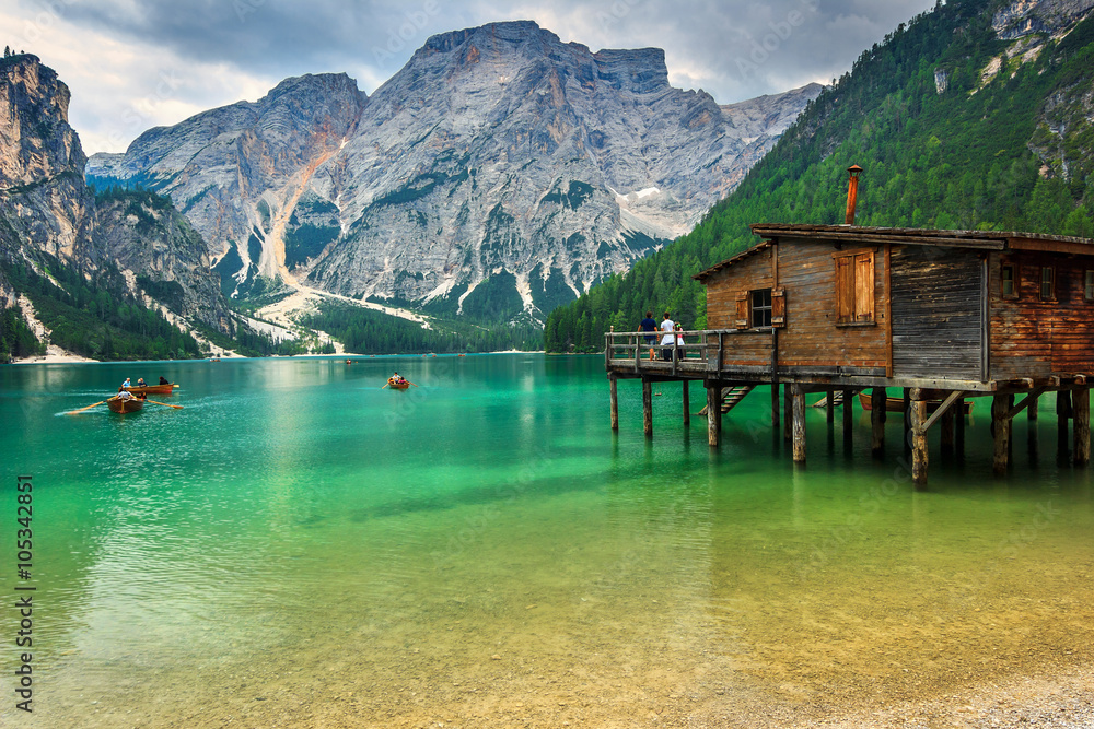 Wooden boathouse on the alpine lake,Dolomites,Italy,Europe