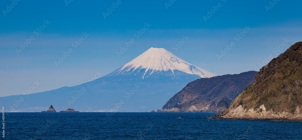 Mountain fuji and Japan sea in winter seen from Izu city , Shizuoka prefecture