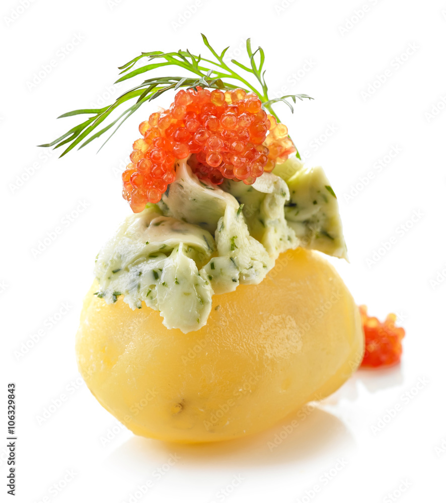 boiled poato decorated with green butter and red caviar