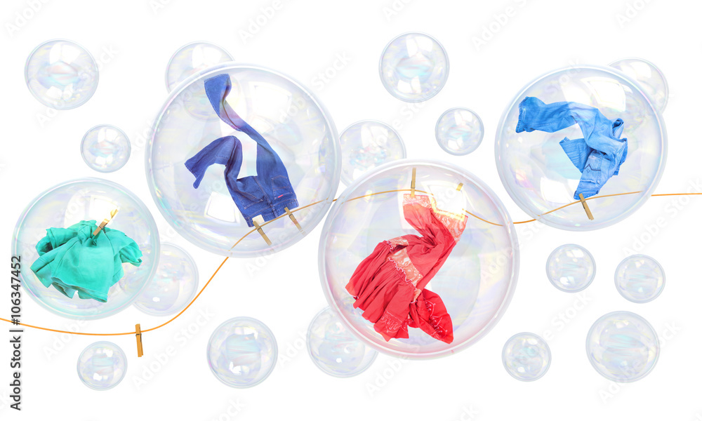things falling in soap bubbles on a white background concept of