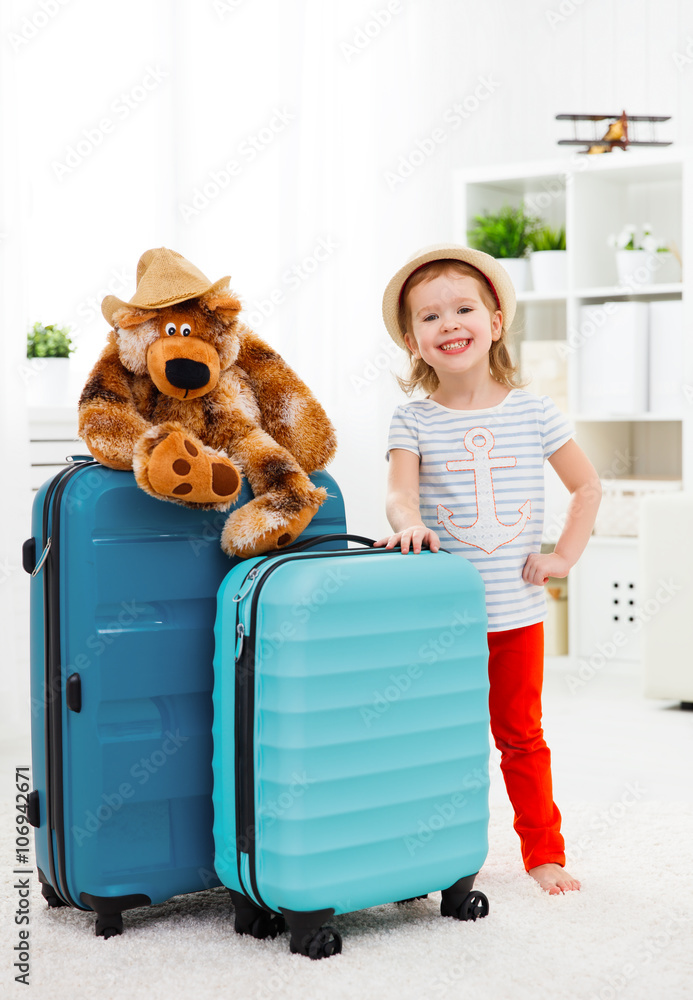 快乐童女度假提行李箱