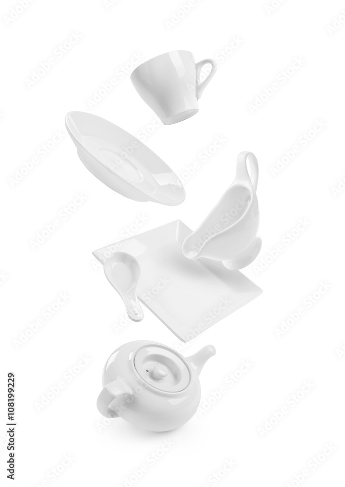 dishes in flight on white background
