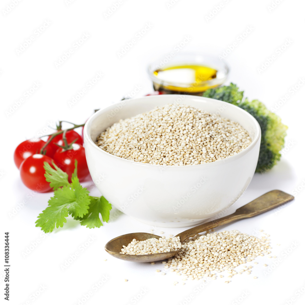 Bowl of healthy white quinoa seeds with vegetables