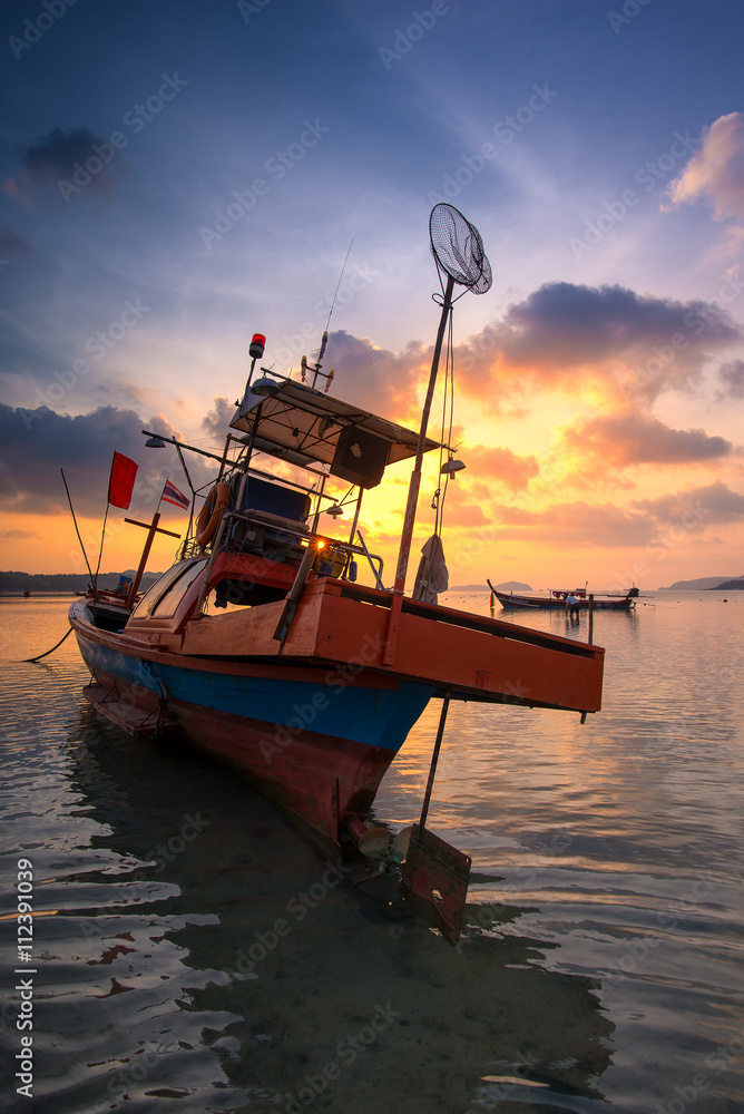 Long tail boat at sunrise in Thailand.