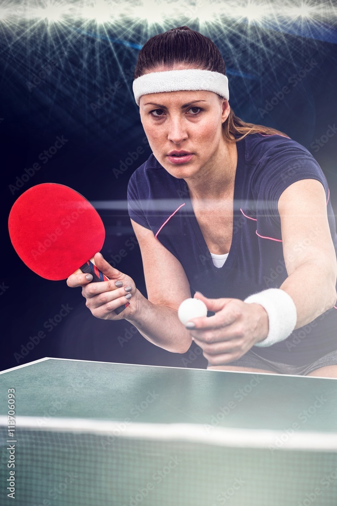 Composite image of female athlete playing table tennis