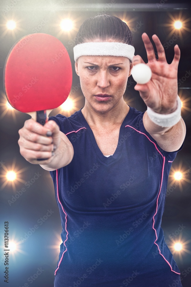 Composite image of female athlete holding table tennis paddle and ball