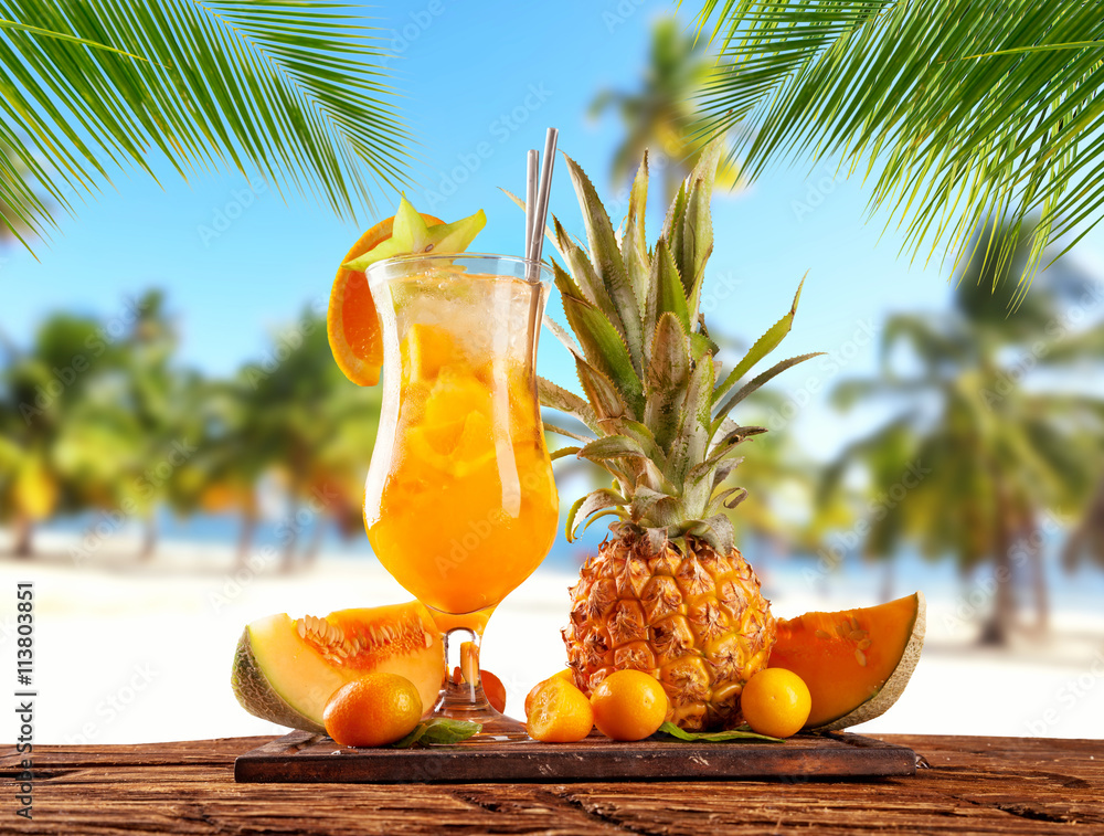 Summer sandy beach with fruit ice drink