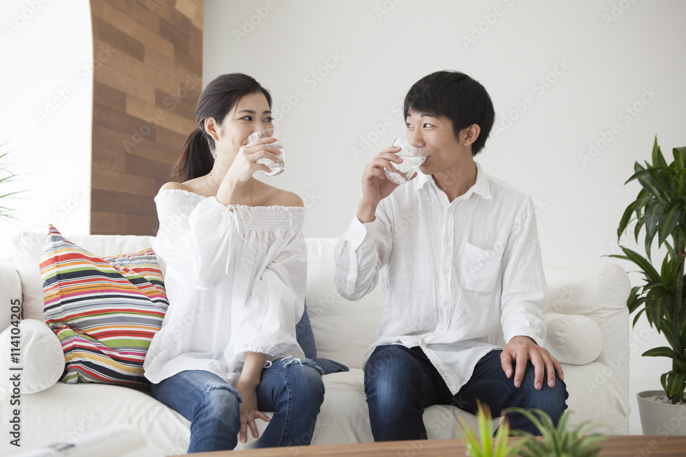 Young couple are drinking delicious water