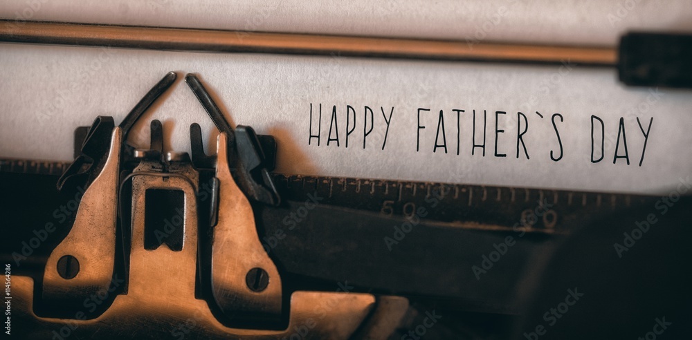 Happy fathers day written on paper