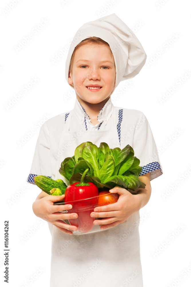 Young smiling cook with bowl of fresh vegetables