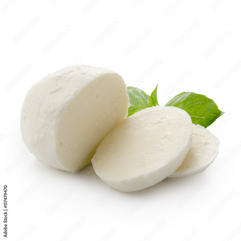 Piece of white mozzarella isolated on white background with clipping path. Decorated with basil. Fro