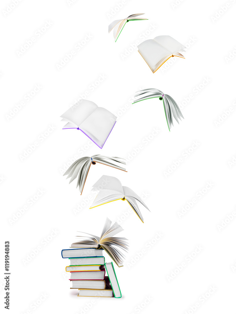 stack of books and flying books isolated on white
