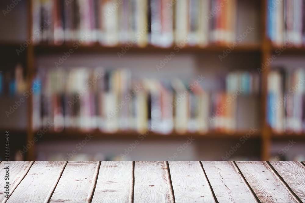 Wooden table with library background